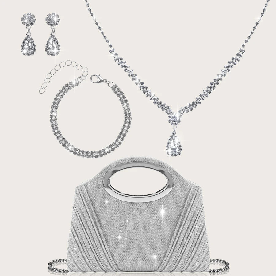 A gorgeous and sparkly party bag for women paired with a stunning four-piece rhinestone necklace, earrings and bracelet set.